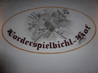 Ein Zertifikat, Auszeichnung, Logo oder anderes Dokument, das in der Unterkunft Spielbichlhof ausgestellt ist