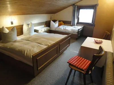 Ein Bett oder Betten in einem Zimmer der Unterkunft Spielbichlhof