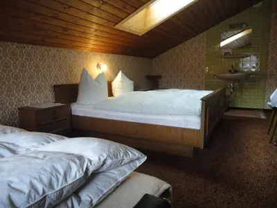 Ein Bett oder Betten in einem Zimmer der Unterkunft Spielbichlhof