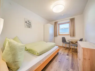 Ein Bett oder Betten in einem Zimmer der Unterkunft Festenhof