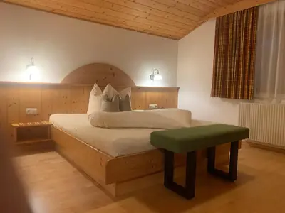 Ein Bett oder Betten in einem Zimmer der Unterkunft Appartement Top Tirol