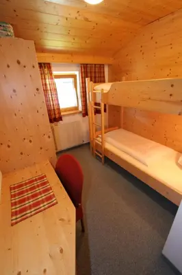 Ein Bett oder Betten in einem Zimmer der Unterkunft Appartement Top Tirol
