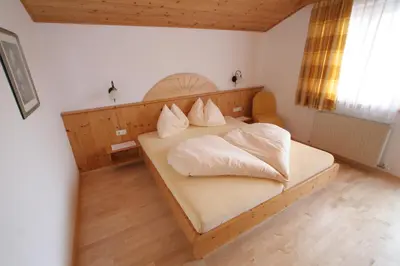 Ein Bett oder Betten in einem Zimmer der Unterkunft Appartement Top Tirol