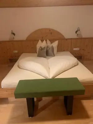 Ein Bett oder Betten in einem Zimmer der Unterkunft Appartement Top Tirol