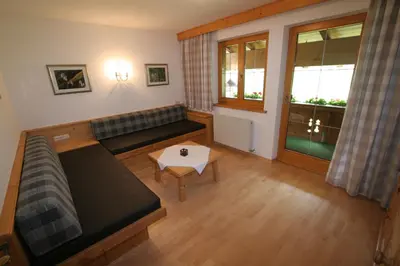 Ein Sitzbereich in der Unterkunft Appartement Top Tirol