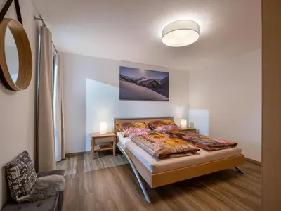 Ein Bett oder Betten in einem Zimmer der Unterkunft Lodge Schönfeld