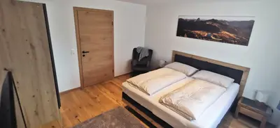 Ein Bett oder Betten in einem Zimmer der Unterkunft Ferienwohnung am Lindenweg