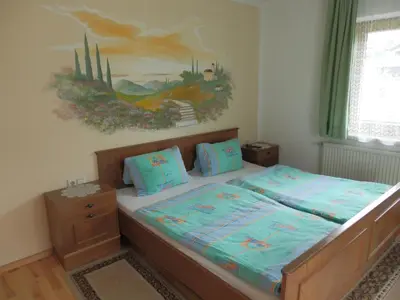 Ein Bett oder Betten in einem Zimmer der Unterkunft Reiserhof