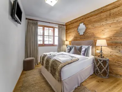 Ein Bett oder Betten in einem Zimmer der Unterkunft Chalet in Mittersill by Ski Lift & Sauna