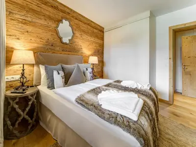 Ein Bett oder Betten in einem Zimmer der Unterkunft Chalet in Mittersill by Ski Lift & Sauna