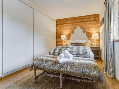 Ein Bett oder Betten in einem Zimmer der Unterkunft Chalet in Mittersill by Ski Lift & Sauna