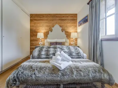 Ein Bett oder Betten in einem Zimmer der Unterkunft Chalet in Mittersill by Ski Lift & Sauna