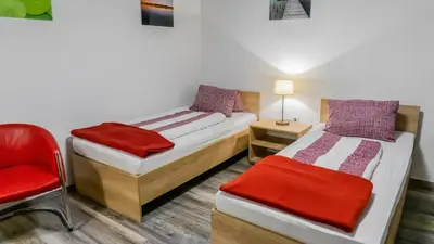 Ein Bett oder Betten in einem Zimmer der Unterkunft Ludwighaus