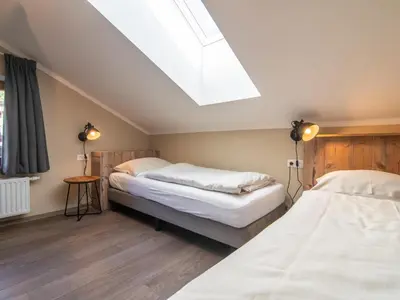 Ein Bett oder Betten in einem Zimmer der Unterkunft Chalet Sonnenalp
