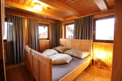 Ein Bett oder Betten in einem Zimmer der Unterkunft DAS LANDHAUS hart zillertal