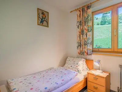 Ein Bett oder Betten in einem Zimmer der Unterkunft Haus Leitner