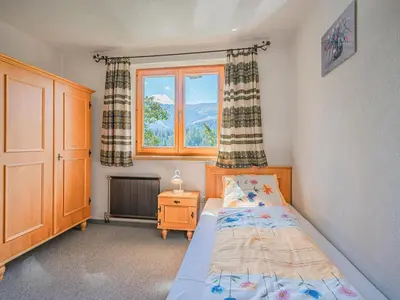 Ein Bett oder Betten in einem Zimmer der Unterkunft Haus Leitner