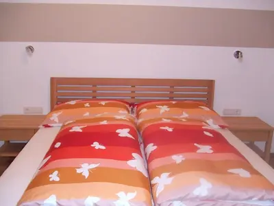 Ein Bett oder Betten in einem Zimmer der Unterkunft apArtment kAtrin & gerhArd