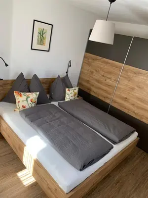 Ein Bett oder Betten in einem Zimmer der Unterkunft Ferienwohnung Lerchenhof