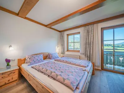 Ein Bett oder Betten in einem Zimmer der Unterkunft Landhaus Hotter 26