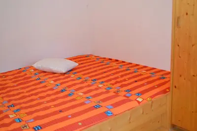 Ein Bett oder Betten in einem Zimmer der Unterkunft Alpensonne