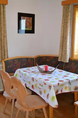 Ein Sitzbereich in der Unterkunft Alpensonne
