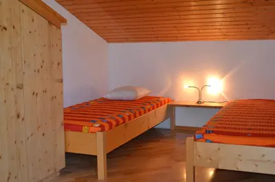 Ein Bett oder Betten in einem Zimmer der Unterkunft Alpensonne