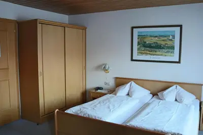 Ein Bett oder Betten in einem Zimmer der Unterkunft Wellness Pension Hollaus