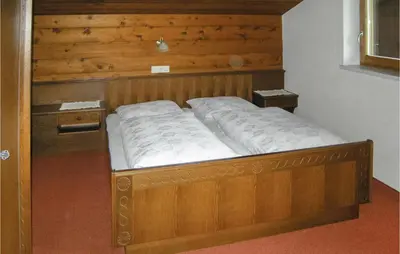 Ein Bett oder Betten in einem Zimmer der Unterkunft Ansprechende Ferienwohnung