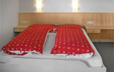 Ein Bett oder Betten in einem Zimmer der Unterkunft Ansprechende Ferienwohnung