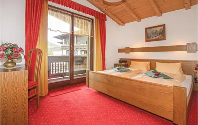 Ein Bett oder Betten in einem Zimmer der Unterkunft Ferienwohnung - Kirchberg