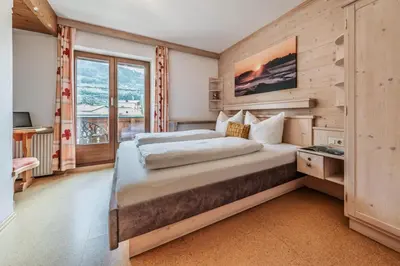 Ein Bett oder Betten in einem Zimmer der Unterkunft Landhaus Rohrmoser