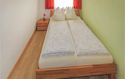 Ein Bett oder Betten in einem Zimmer der Unterkunft Groeßere Ferienwohnung Itter