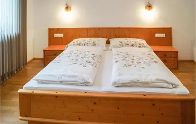 Ein Bett oder Betten in einem Zimmer der Unterkunft Ferienwohnung Im Eg-Niederau