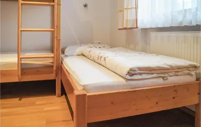 Ein Bett oder Betten in einem Zimmer der Unterkunft Ferienwohnung Im Eg-Niederau