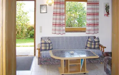 Ein Sitzbereich in der Unterkunft Ruhiges Ferienhaus Breitenbach