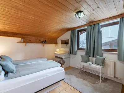 Ein Bett oder Betten in einem Zimmer der Unterkunft Ferienwohnung Gabriele