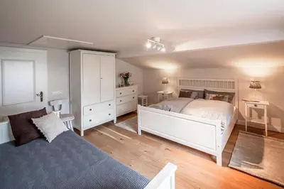 Ein Bett oder Betten in einem Zimmer der Unterkunft Finest Ski Chalet Leogang by All in One Apartments