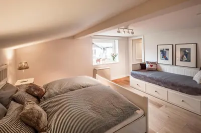 Ein Bett oder Betten in einem Zimmer der Unterkunft Finest Ski Chalet Leogang by All in One Apartments