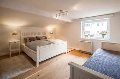 Ein Bett oder Betten in einem Zimmer der Unterkunft Finest Ski Chalet Leogang by All in One Apartments