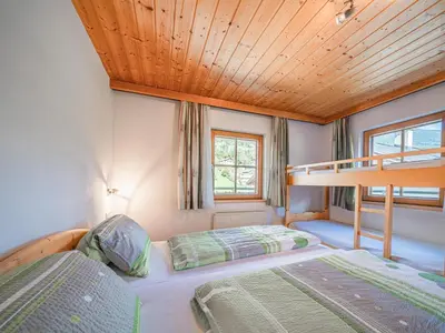 Ein Bett oder Betten in einem Zimmer der Unterkunft Landhaus Hotter 12