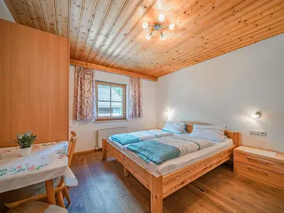 Ein Bett oder Betten in einem Zimmer der Unterkunft Landhaus Hotter 12