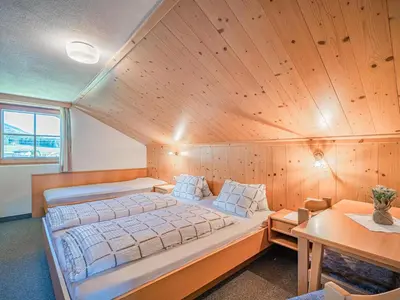 Ein Bett oder Betten in einem Zimmer der Unterkunft Landhaus Hotter 18