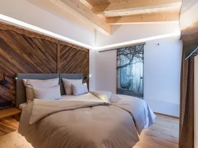 Ein Bett oder Betten in einem Zimmer der Unterkunft Chalet zum Schneider Mascht