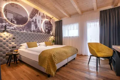 Ein Bett oder Betten in einem Zimmer der Unterkunft der Pinzger