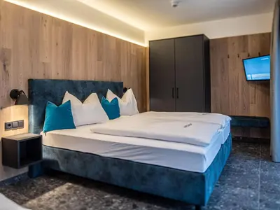 Ein Bett oder Betten in einem Zimmer der Unterkunft Chalet in Wald im Pinzgau near Krimml Falls