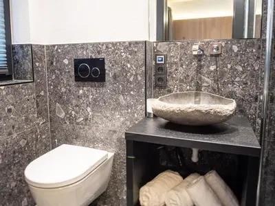 Ein Badezimmer in der Unterkunft Chalet in Wald im Pinzgau near Krimml Falls