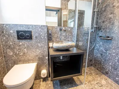 Ein Badezimmer in der Unterkunft Chalet in Wald im Pinzgau near Krimml Falls
