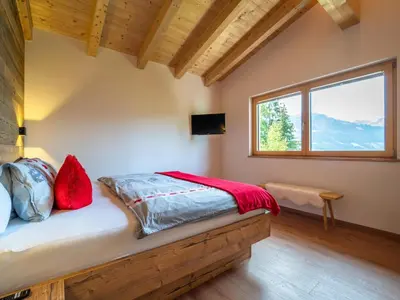 Ein Bett oder Betten in einem Zimmer der Unterkunft Chalet Georg