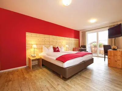 Ein Bett oder Betten in einem Zimmer der Unterkunft Hotel Steiger